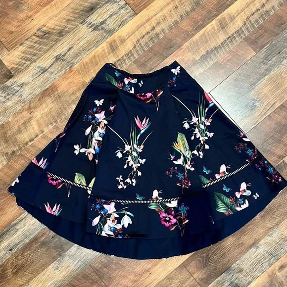 TED BAKER Plio Tropical Oasis Dipped Hem Skirt Navy - Picture 10 of 11
